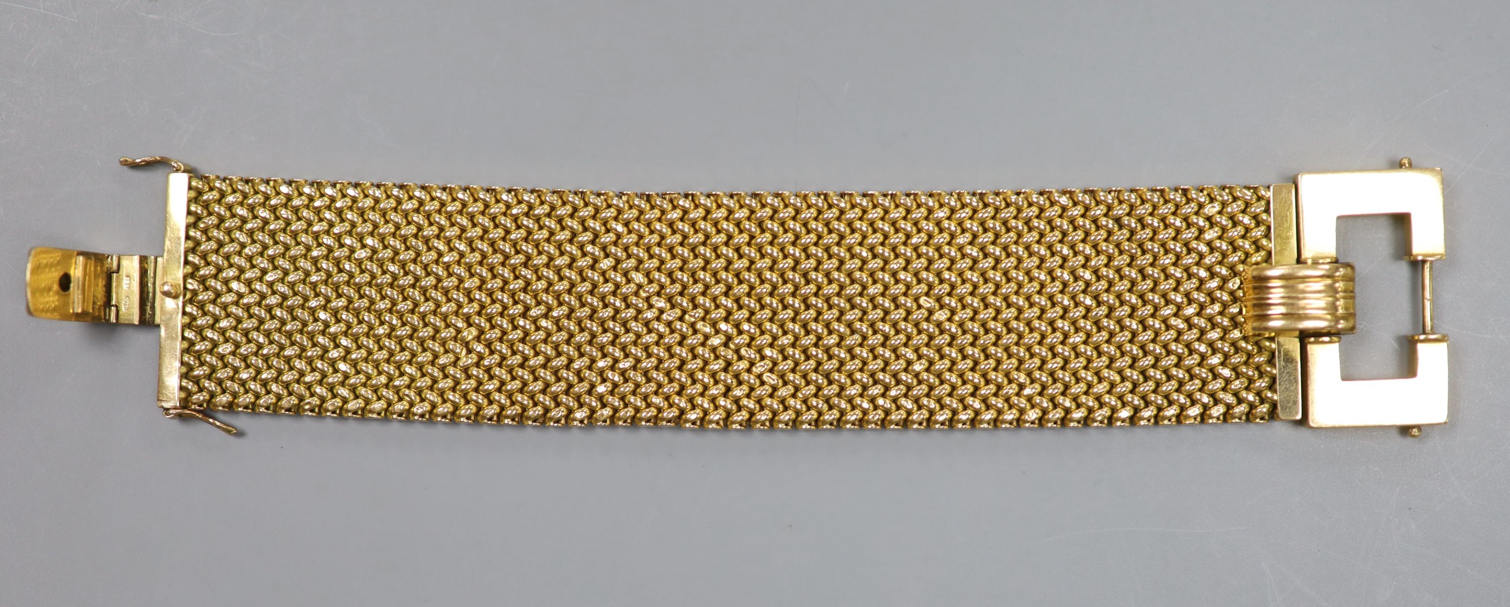 A mid 20th century Italian 750 yellow metal woven link bracelet